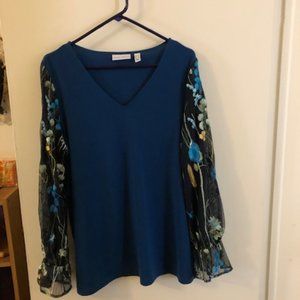 Susan Graver liquid knit blouse, with beautiful embroidered sleeves.  Size L